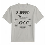 Suffer Well Tee — Cement, front